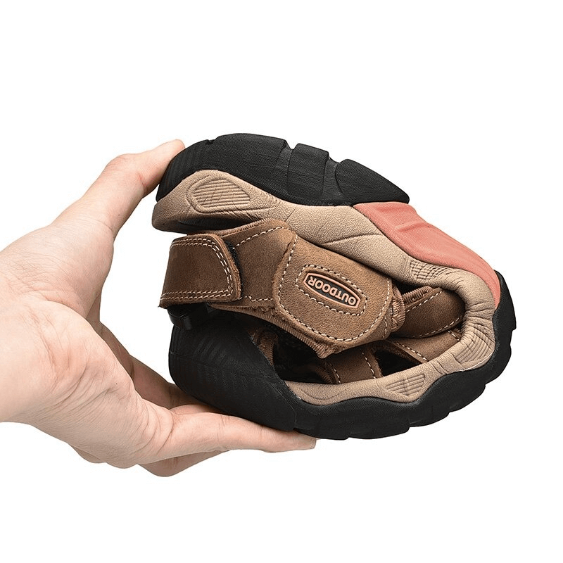 Flexible outdoor leather tactical trekking sandals for men, showcasing foldable design and durable craftsmanship, perfect for hiking.